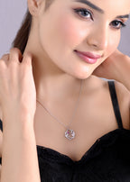 Silver Organic Leaf Swirl Pendant with Ruby Red Stone