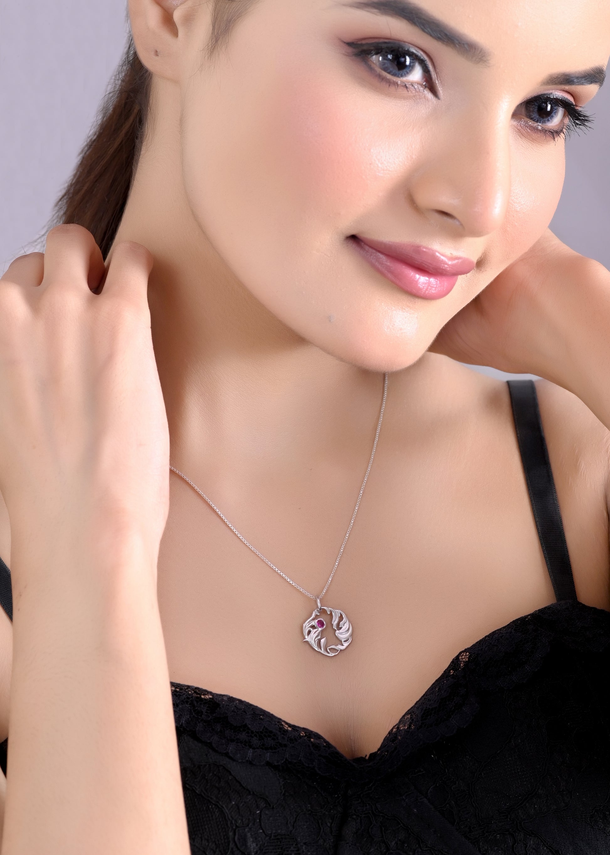 Silver Organic Leaf Swirl Pendant with Ruby Red Stone