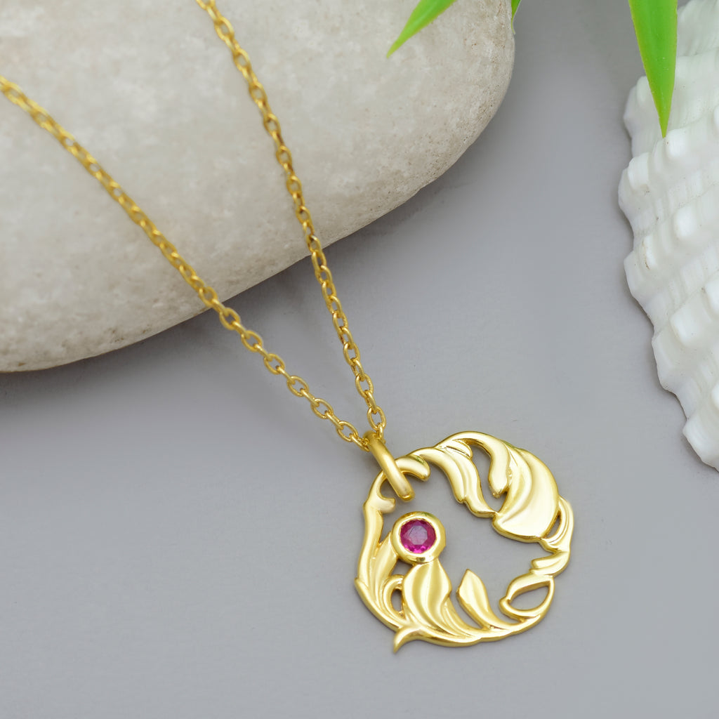 Silver Organic Leaf Swirl Pendant with Ruby Red Stone