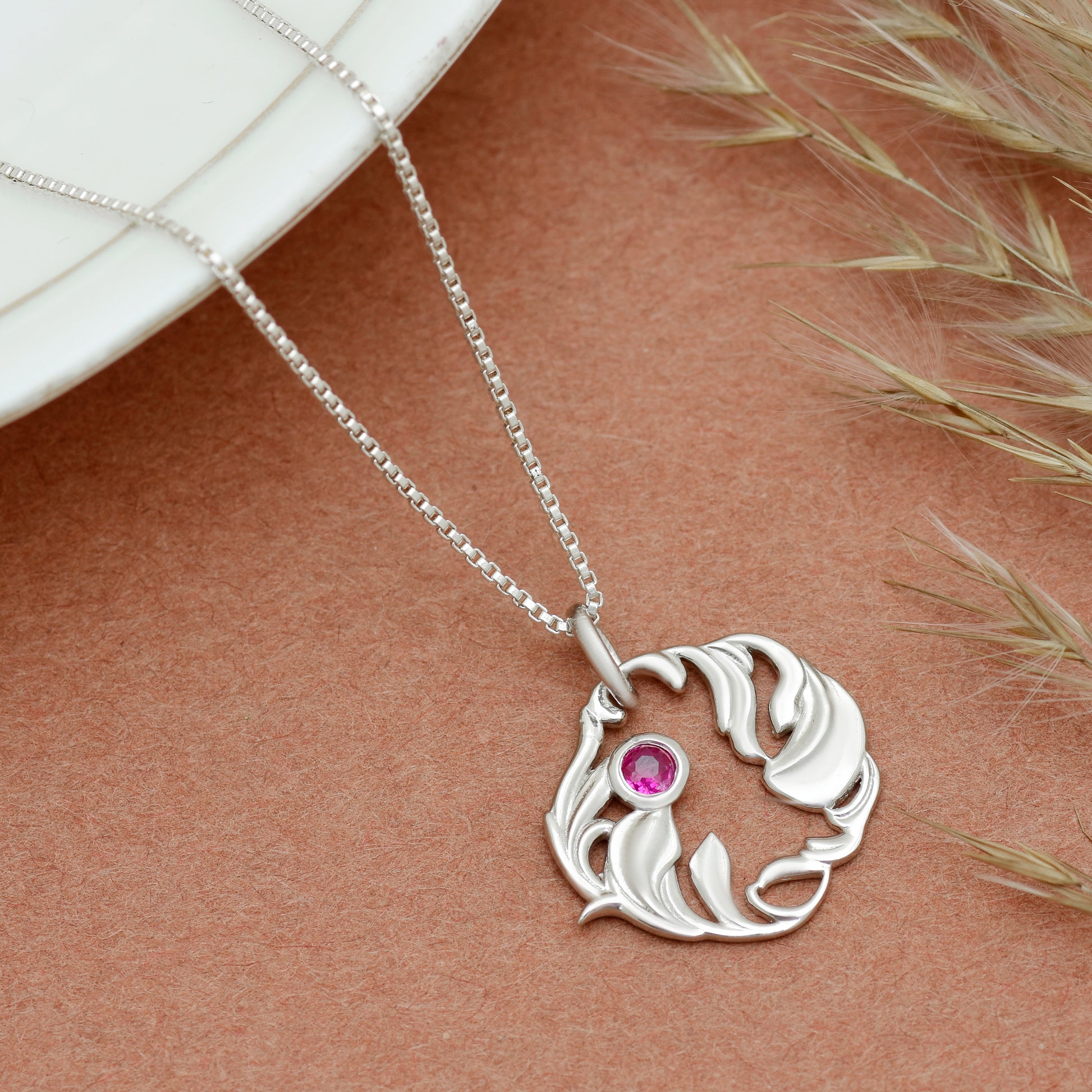 Silver Organic Leaf Swirl Pendant with Ruby Red Stone