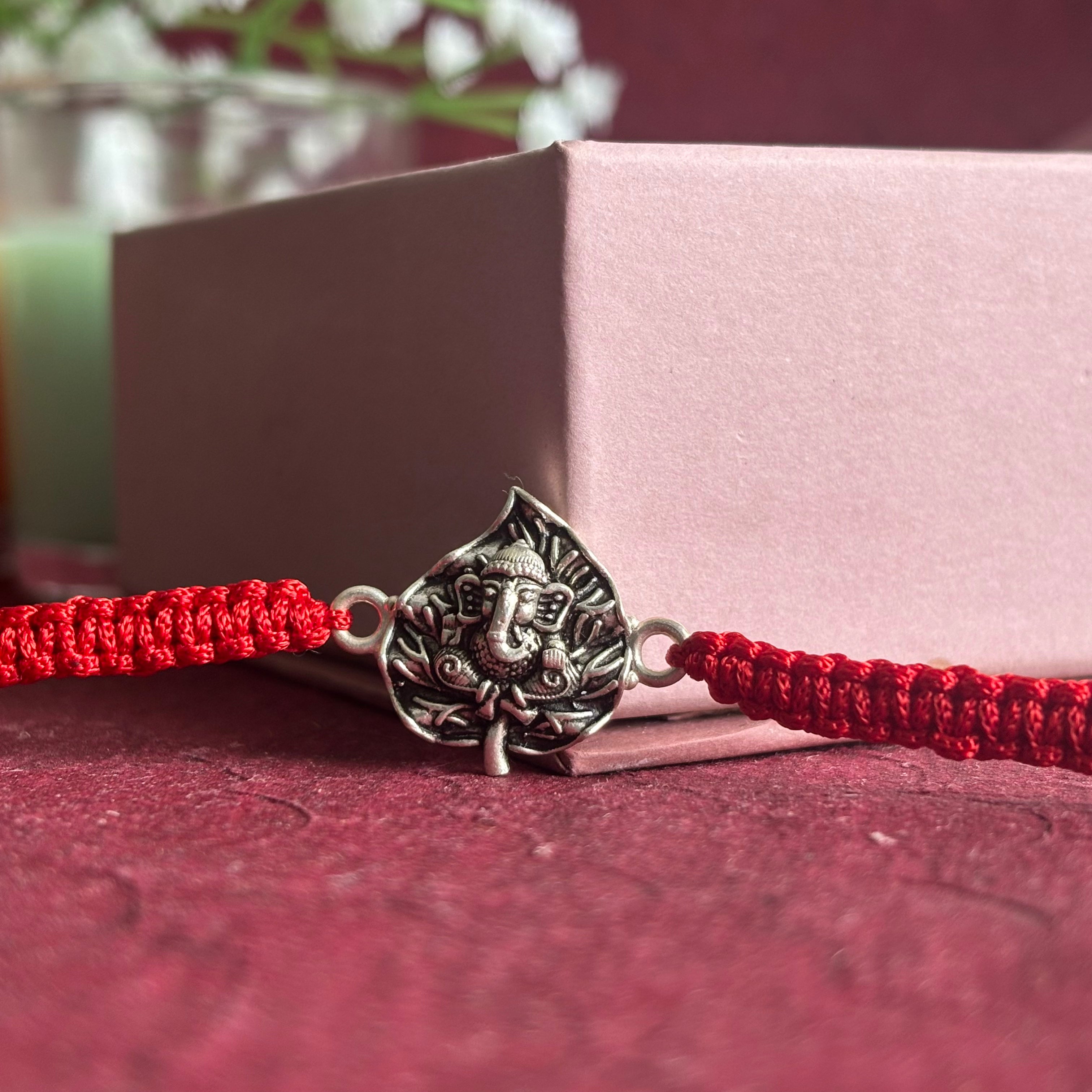 Divine Ganpati Rakhi in Silver