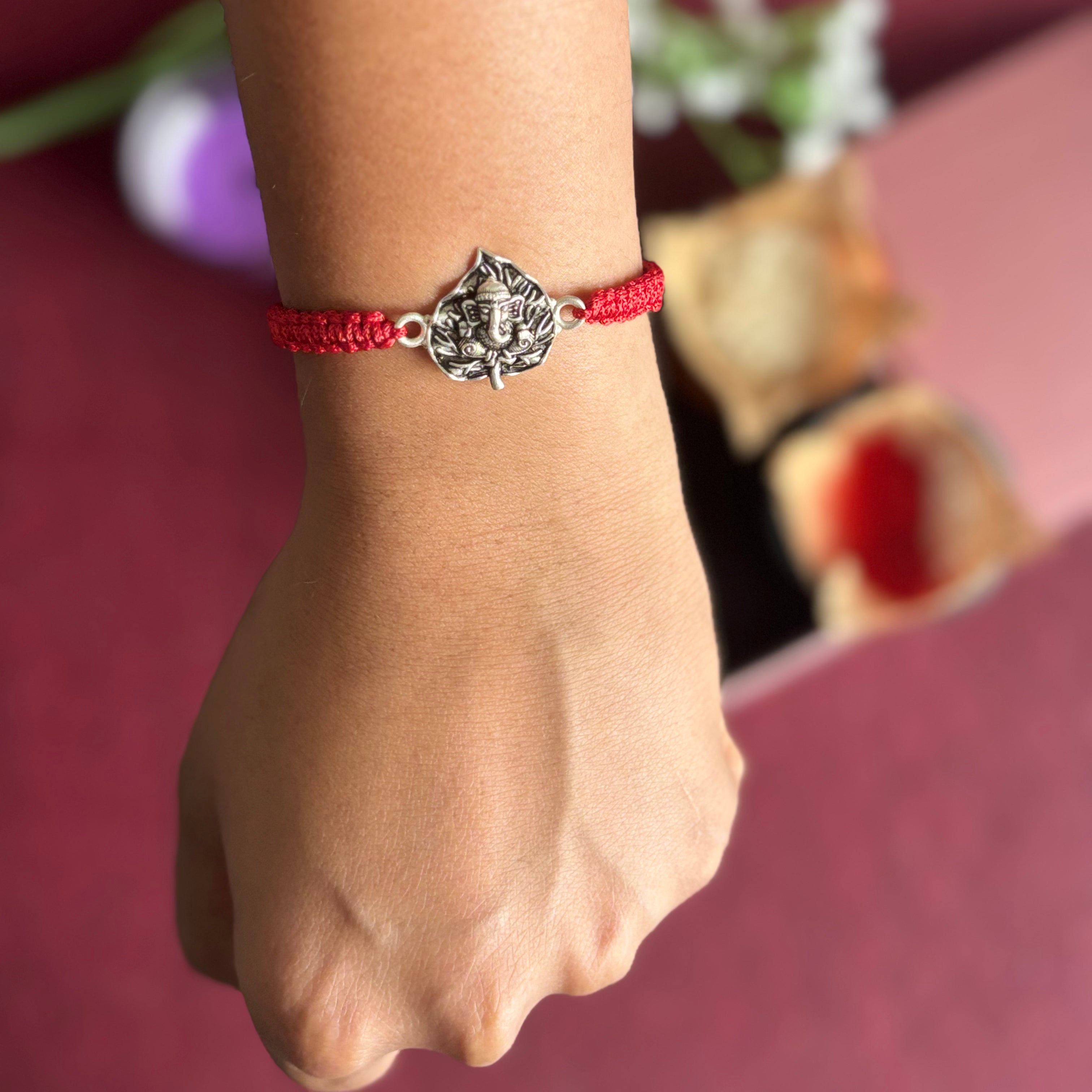 Divine Ganpati Rakhi in Silver