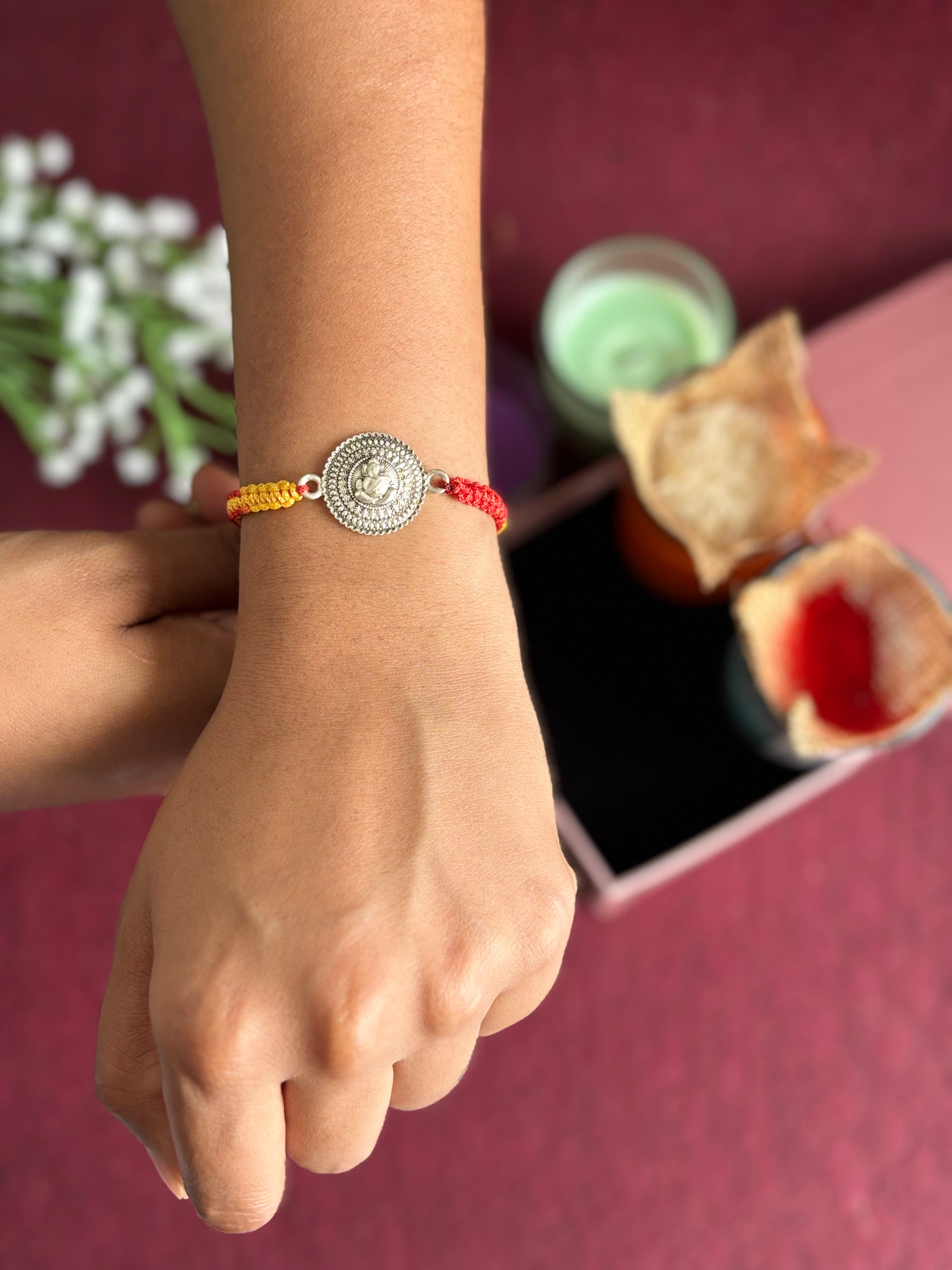 Sacred Bond with Ganpati – 925 Silver Rakhi for Divine Raksha