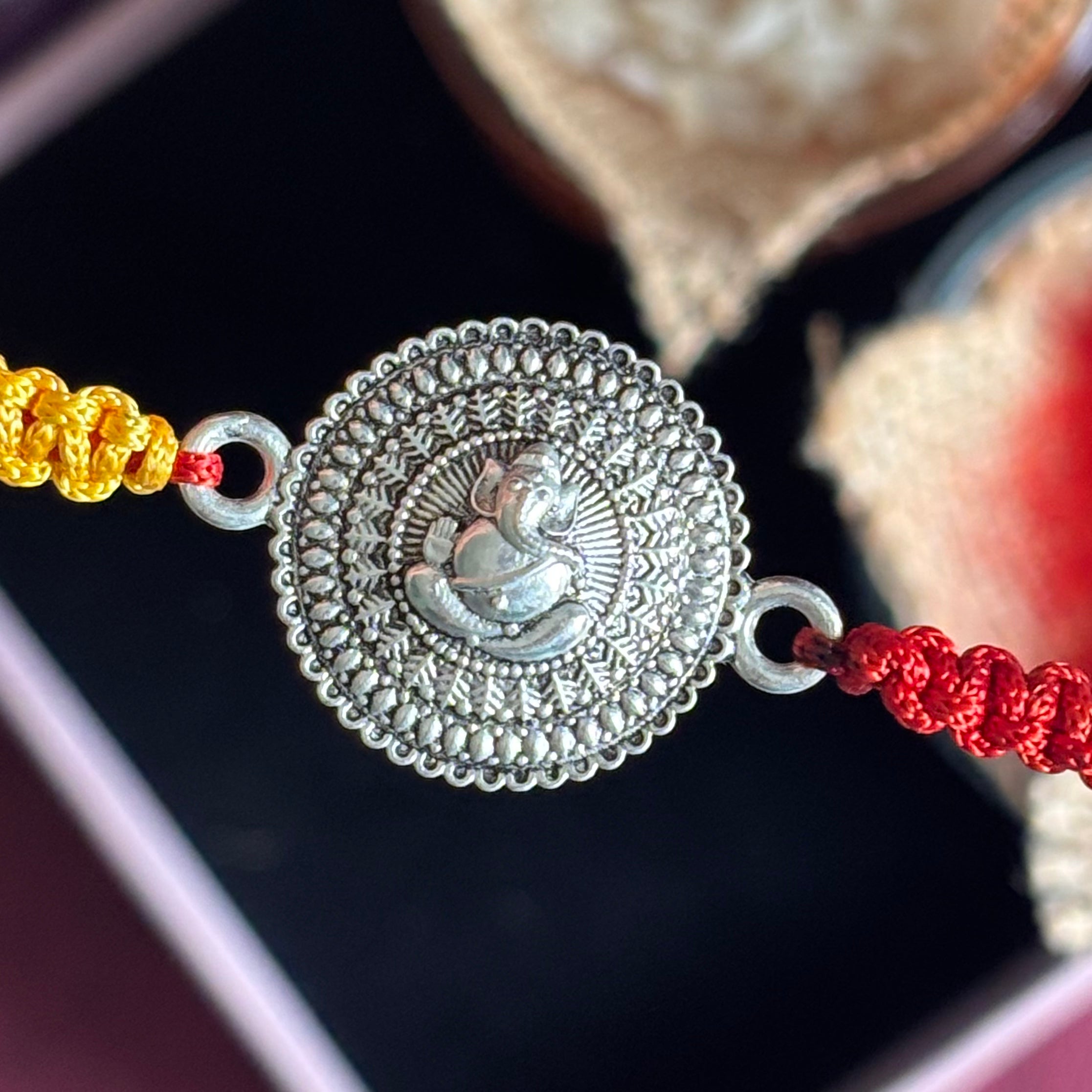 Sacred Bond with Ganpati – 925 Silver Rakhi for Divine Raksha