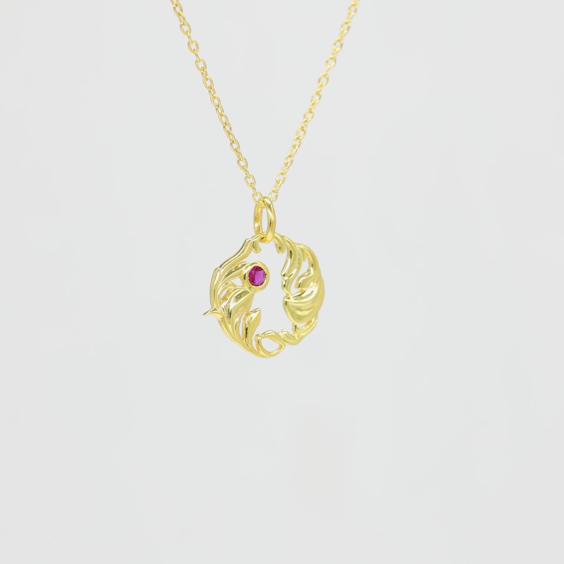 Silver Organic Leaf Swirl Pendant with Ruby Red Stone